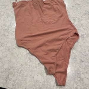 Woman’s sleeveless bodysuit